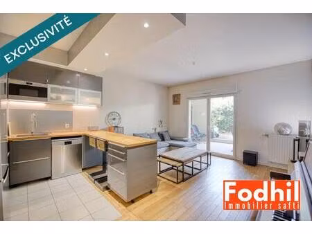 appartement 3 pièces 62 m² avec terasse et jardin  parking et cave.