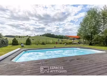 entre design et nature  maison d'architecte avec piscine et vue dégagée