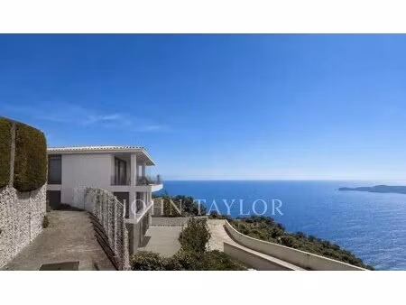 saint- roman frontiere monaco - terrain avec permis purge - deux villas vue mer - garages.