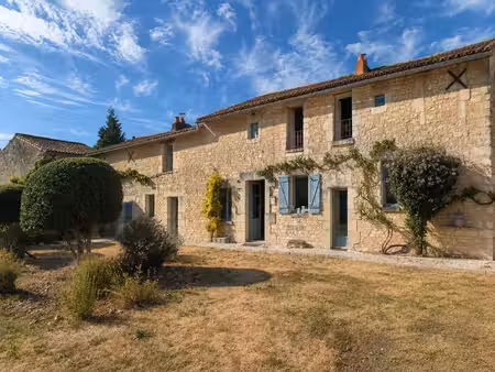 maison de caractère en pierre avec dépendances et jardin clos – la roche-rigault