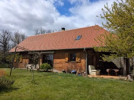 maison en bois avec dépendance