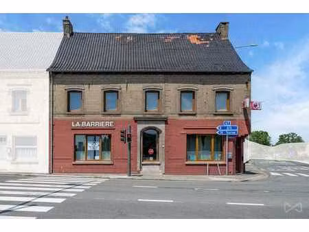 immeuble mixte avec commerce  habitation et terrain à bâtir