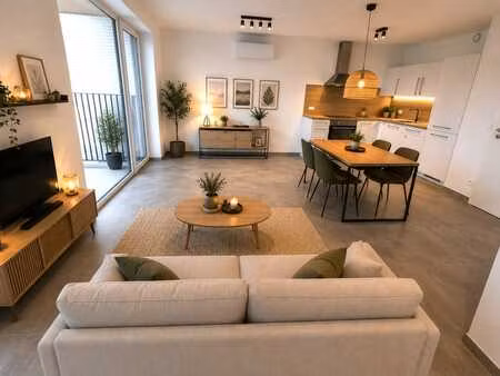 appartement neuf 2 ch. - terrasse - parking - cave.
