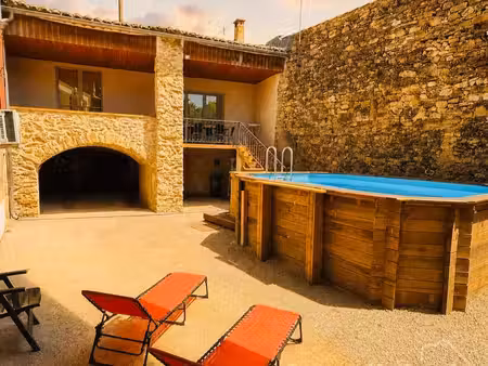 maison en pierres de 125m2 sur 313m2 de terrain à cornillon