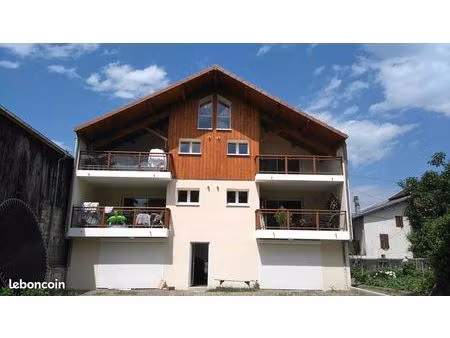 très bel appartement 4 pièces duplex avec terrasse et place de parking couverte