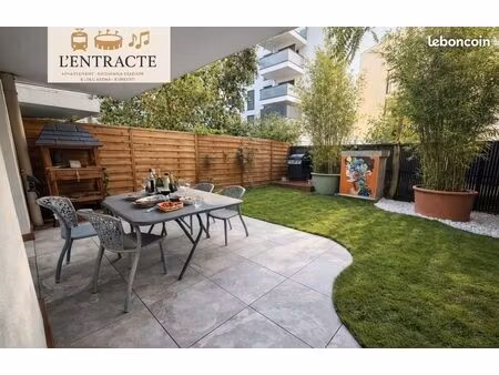 t2 meublé haut de gamme avec jardin privatif – esprit loft modulable