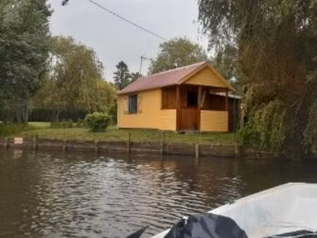 echange un chalet contre une petite maison à rénover