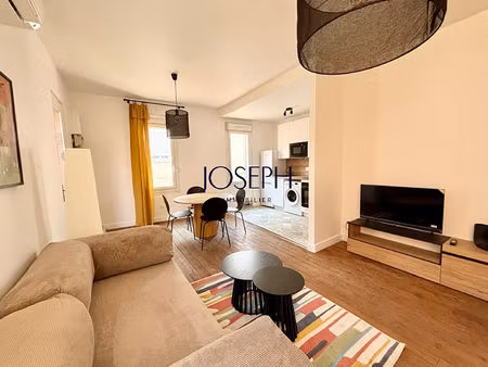 saint cyprien - rare t2 meublé de 47 m² climatisé  avec terrasse dans petit immeuble ancie