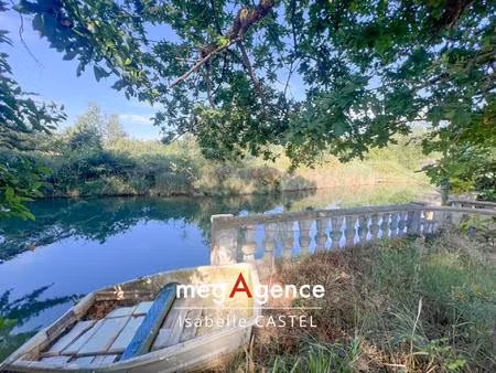 exceptionnel ! grande maison et 9 200 m² de terrain bordé par une rivière aux portes des s