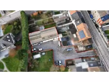 entrepot avec terrain situe en zone d'habitat a monceau !