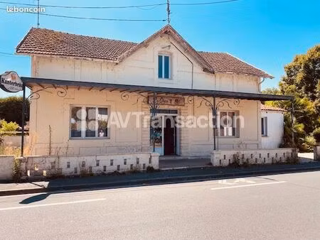 bâtiment à usage de commerce bar/ resto/autres + habitation
