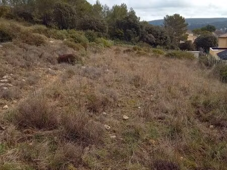 terrain 1100m2 centre village