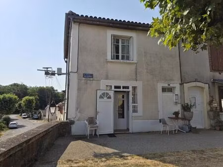 à vendre  trie-sur-baïse (hautes-pyrénées): maison mitoyenne avec 2 chambres et un garage/