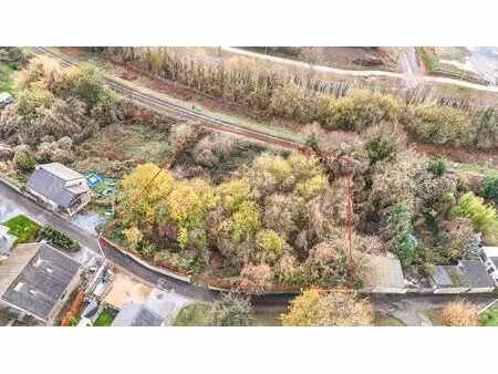 terrain à bâtir de 1.784 m² idéalement situé à huy !
