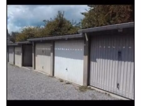garage centre ville hirson sol enrobé