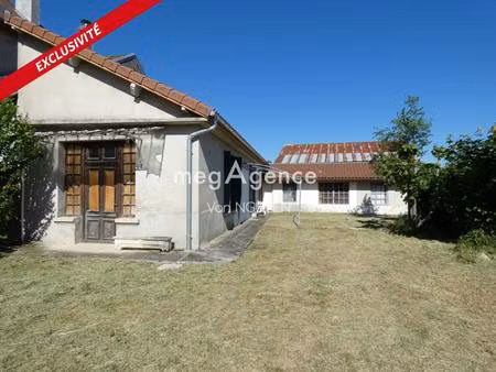 maison avec potentiel et terrain constructible