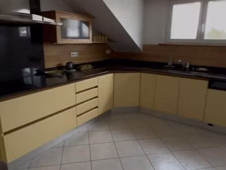 appartement 129m² au sol – 3 ch. – balcon – parking – sous sol