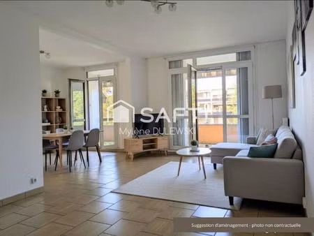 appartement avec deux balcons et garage fermé