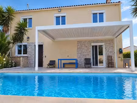 330.000€ - villa 6p 4ch 155m² + t2 locatif + piscine chauffée – jardin – garage - dpe b –.