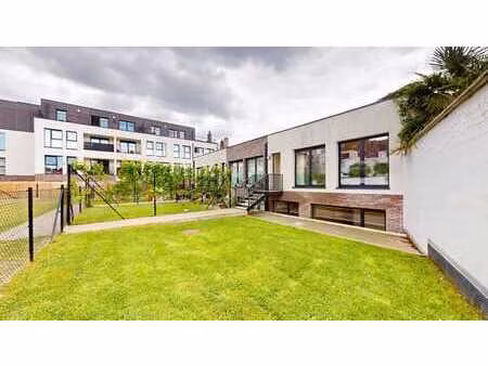 laeken - duplex 2 ch - jardin - construction récente - peb c