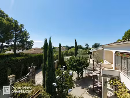 ensemble immobilier : maison de rapport et terrain constructible avec division parcellaire