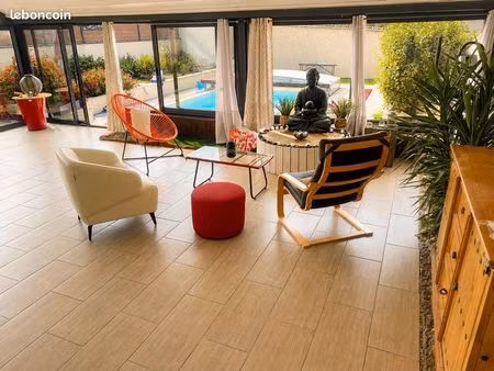 maison avec véranda de 48 m²  piscine et jardin à chazelles sur lyon