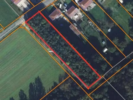 terrain 2738 m² quernes
