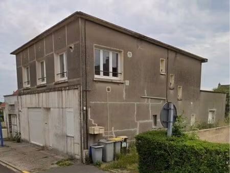 immeuble 2 appartements garage + terrain constructible