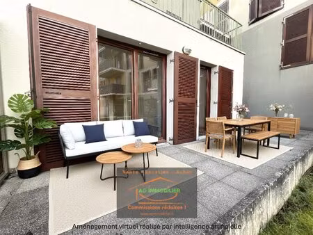 pacé  appartement t3 de 62.5 m2 en rez-de-jardin avec grande te