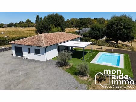 maison de 118 m² avec piscine et garage sur un terrain de 1 950