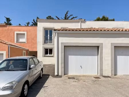 maison avec garage en résidence sécurisée