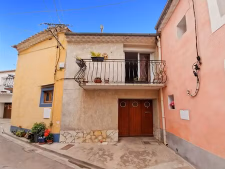 maison de village avec garage  patio et beau potentiel d'aménagement