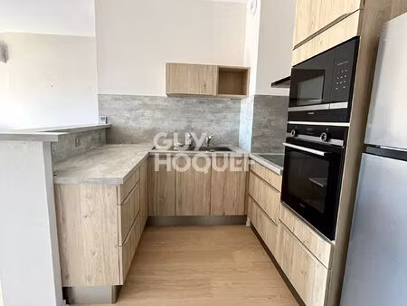 appartement t2 climatisé avec terrasse et garage fermé