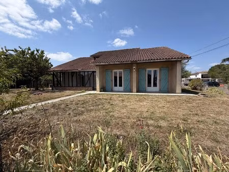 maison de 152m2 habitable avec véranda et garage sur un jardin de 641m2