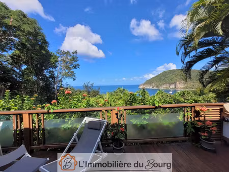 villa d'exception avec vue panoramique sur la mer des caraïb