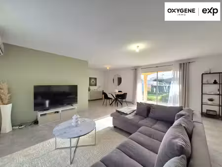 maison plain pied sur 4 faces avec jardin et garage au calme