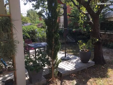 maison de ville 4 faces avec jardin plein centre