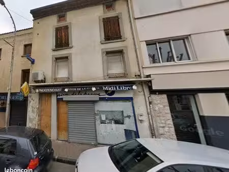 vends immeuble commercial et habitation