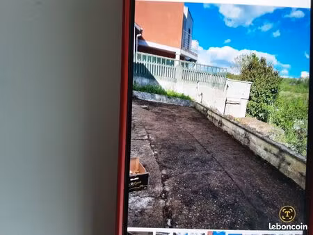 terrain avec maison à raser