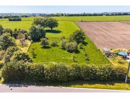 terrain à bâtir  hors lotissement  25a 94ca  +- 40m à route