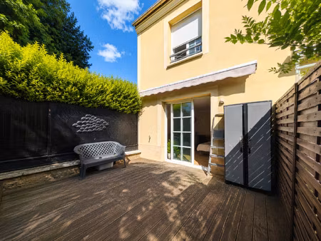 maison 4 pièces de 100m2 avec 3 chambres et un jardin
