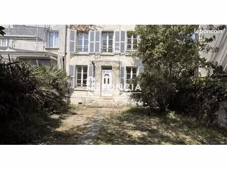 maison avec jardin au centre ville