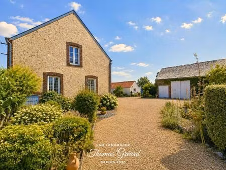 propriété en pierre avec dépendances  vie de plain-pied et terrain de 2 168 m² à 10 minute