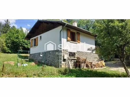 chalet de 51m² avec 51m² de garage en sous sol sur 760m² de terrain