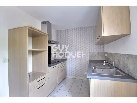 à vendre – duplex avec terrasse  parking et cave à neuves-maisons
