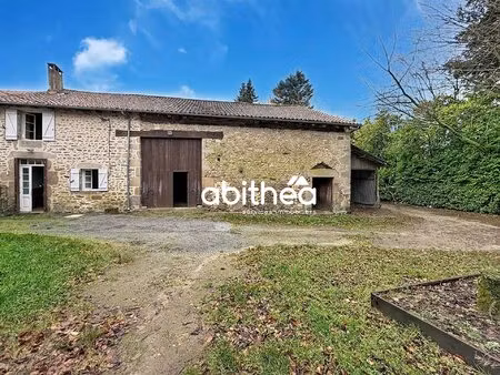maison de bourg en pierres  avec terrain de 2200m2