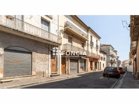 béziers centre - immeuble de rapport 238 m² : 2 t4  garage et local commercial  fort poten