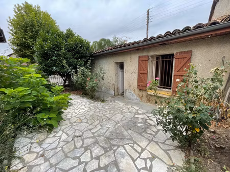 maison de plain pied + garage avec jardins