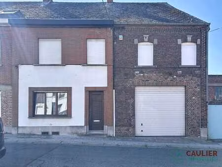 maison 4 chambres avec jardin et garage.
