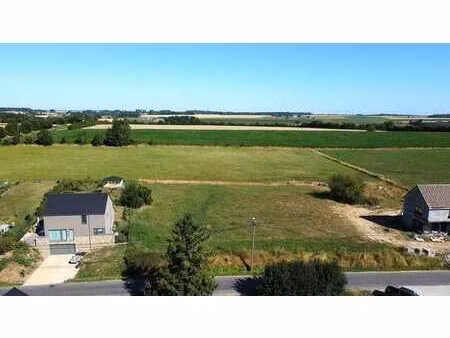 terrain plat – villa 4 façades – façade ±26 m – vue campagne